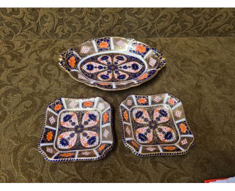 Royal Crown Derby 1128 Imari pattern oval dish and a pair of pin dishes, oval dish 23cm diameter, pin dishes 12 cm square.