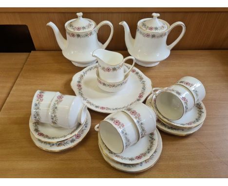 Paragon Belinda (Royal Albert) tea service to include 6 teacups, saucers and side plates, 2 teapots, cake plate, sugar and cr