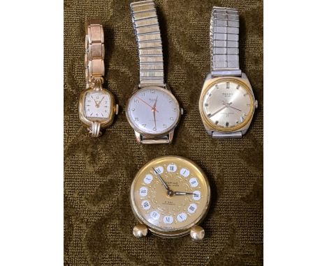 Tasso, Roma and Timex movement wristwatches and a Looping 8 day travel alarm clock.
