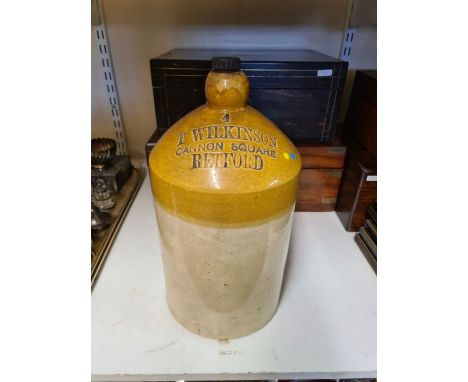 Stoneware flagon "T. Wilkinson Cannon Square, Retford" standing 14" tall with top.