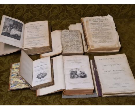 De Laudibus Legum Anglie by John Fortescue 1677 and other books.  Poor binding, loose covers, pages secure.  The Microscope M