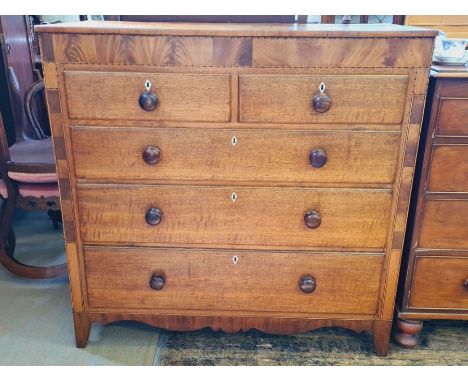 Large mid 18th century 5 drawer oak chest with broad mahogany crossbandings with feathered inlays on bracket feet, shaped bas