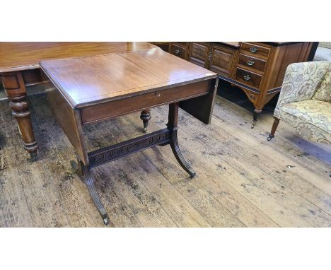 Victorian mahogany sofa table with ebony strung and crossbanded top with reeded sabre legs and Greek key stretcher.