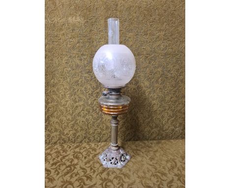 Victorian Hinks Duplex burner oil lamp with brass column and cast base moulded with cherubs beehive vessel and etched shade.