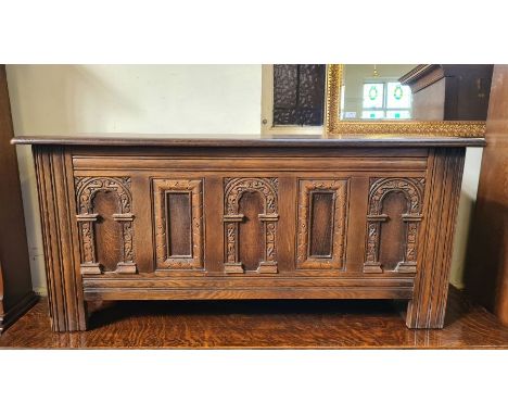 Old Charm oak linen box with square and arch panel decoration with solid plank top, 45" wide, x 21" high x 18" deep.