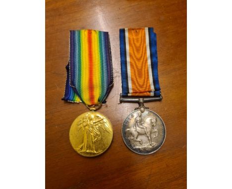 Pair of WWI medals awarded to Second Lieutenant R. Woolcott.