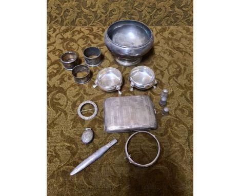 350g mixed sterling silver, napkin rings, salts, cigarette case, bangle, pencil holder, brooch and thimbles.