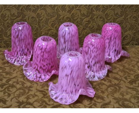 Set of 6 mottled pink flared glass light shades.