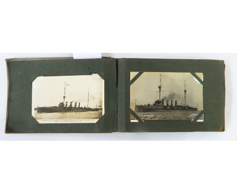 Postcard album containing WWI ship, steamship, regiment and other naval ships and a quantity of loose cigarette cards
