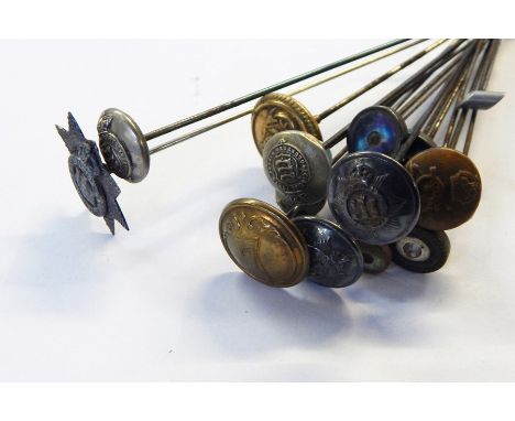 Quantity of hat pins with military button and badge terminals, including Devonshire badge 