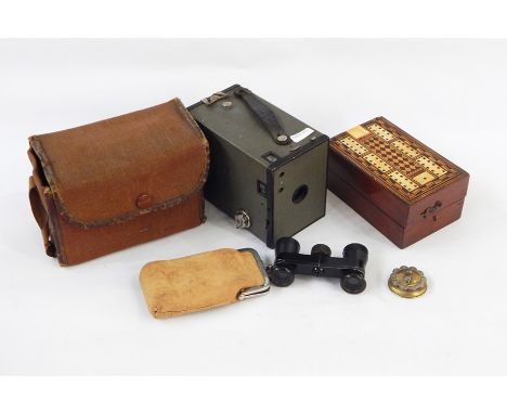 No.2 box brownie camera in case, brass and white metal whist marker, inlaid tunbridgeware cribbage board, pair of opera glass