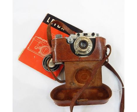 Leica III Model F, circa 1933, serial number 59542, in leather case and a Leica Guide book 