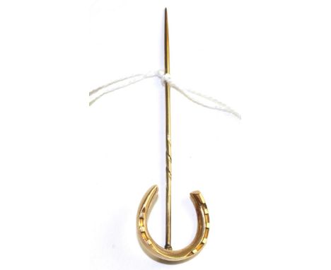 A horseshoe stick pin, measures 2.1cm by 7.8cmThe stick pin is in good condition. It is not hallmarked or stamped but in our 