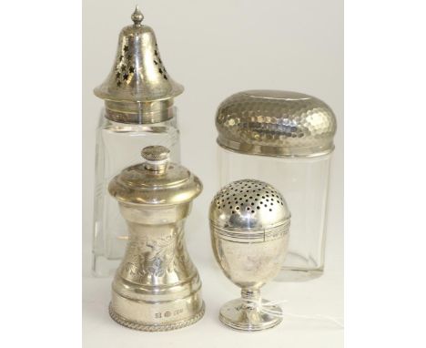 A Victorian silver pepperette, London 1878, a silver pepper grinder, Birmingham 1979, toilet jar with silver plated top, and 