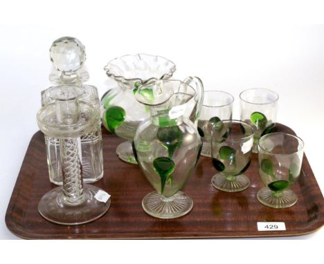 An Loetz style iridescent glass baulster vase, 20th century, 33cm; an Austrian glass drinks set applied with green prunts com