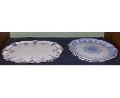 A Victorian Royal Crown Derby tea tray of shaped oval, 1895, printed underglaze blue with stylised formal foliage, within gil