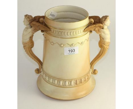 A Royal Worcester porcelain twin handled vase, late 19th century, with caryatid handles, 23cm high 