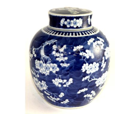 A Chinese porcelain ginger jar and cover, 19th century, of ovoid form, painted in underglaze blue with the cracked ice and pr