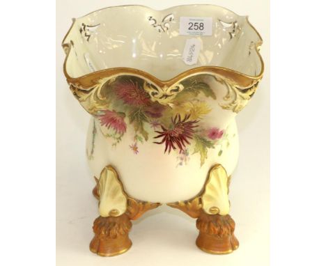 A Royal Worcester porcelain jardiniere, 1908, of square form on four hoof feet, painted with chrysanthemums, printed mark, 23