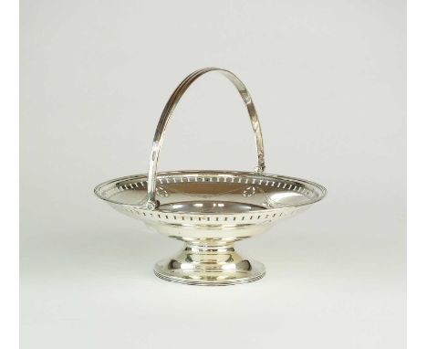 A silver swing handled basket, William Hutton &amp; Sons Ltd, London 1910, the circular basket with pierced and engraved swag