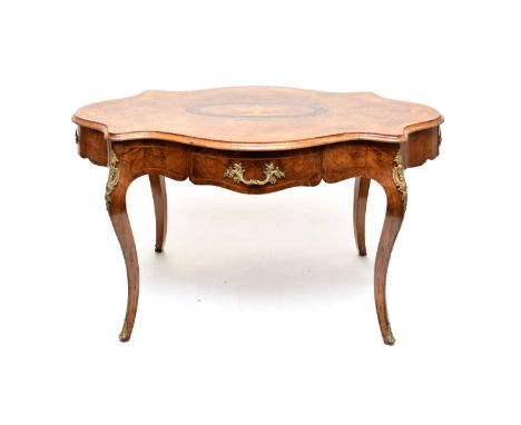 A Victorian, Louis XV style, marquetry and inlaid walnut veneered and gilt metal mounted serpentine table, the cyma reversa m