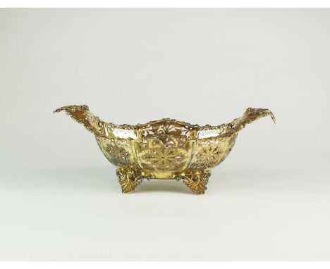 A Victorian silver gilt basket, Thomas Bradbury &amp; Sons, London 1896, of marquise form with decorative pierced body, cast 