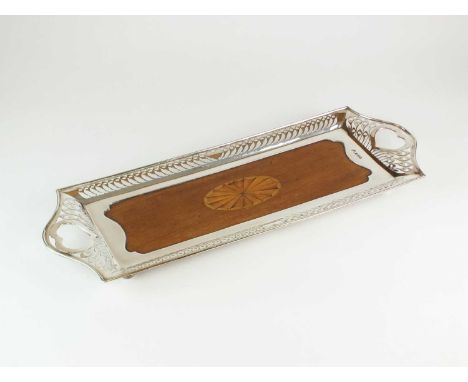 An Edwardian silver mounted inlaid wood tray, Ackroyd Rhodes, London 1902, of elongated rectangular form, the silver mount wi