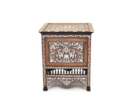 A 19th century Syrian, square, hardwood and walnut occasional table, inlaid with bone and white metal and profusely inlaid wi