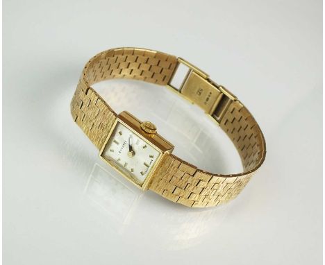 A Lady's 9ct gold Rodania bracelet wristwatch, the square dial with batons, manual wind, with attached textured brick link br