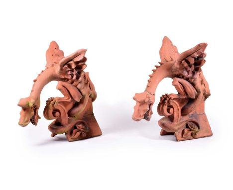 A pair of Ruabon terracotta roof gargoyles, circa 1880The mythical beasts with sinuous legs and wings, the elongated necks wi