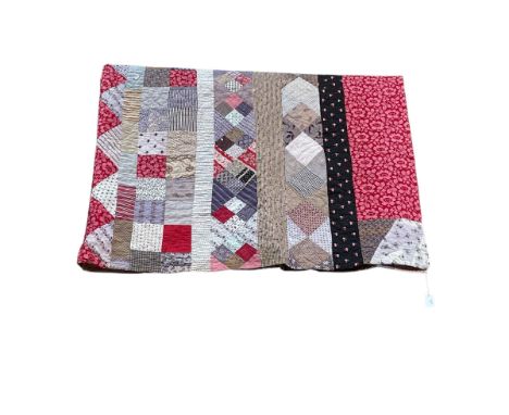 Hand stitched Durham patchwork quilt.