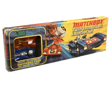 Matchbox Superfast G100 twin Thunderbolt Launcher gift set comprising (1) 7b Hairy Hustler - metallic bronze body with blue b