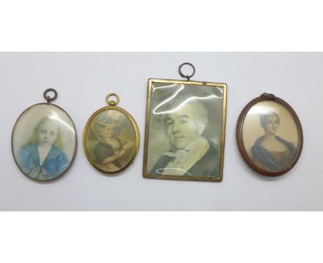 Four portrait pictures, in frames 