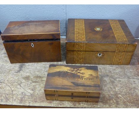 A 19th Century inlaid workbox with some haberdashery contents, a Georgian tea caddy with etched glass jar and a marquetry box