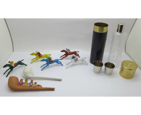 Five Chad Valley Escalado game horses, two pipes and a glass flask with two cups in a case in the form of a shotgun cartridge