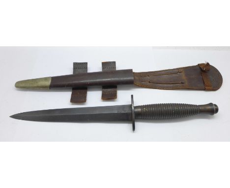 A Commando knife and scabbard 