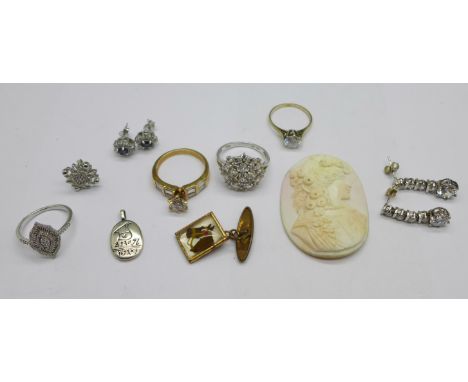 A silver and diamond set navette shaped ring, N, three other rings, two pairs of earrings, etc. 