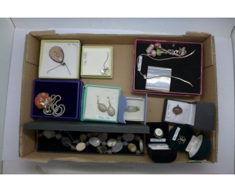 A collection of silver and silver mounted jewellery and a stone ring 