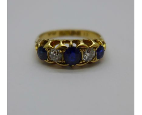 An Edward VII 18ct gold, sapphire and diamond ring, Chester 1903, 3.9g, L 