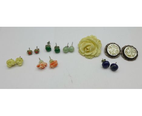 Jade, coral and mother of pearl set earrings, etc., and a carved brooch 