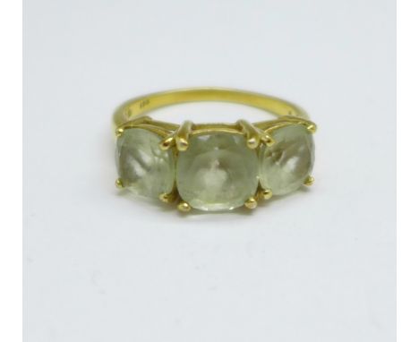 A silver gilt three stone ring, S 