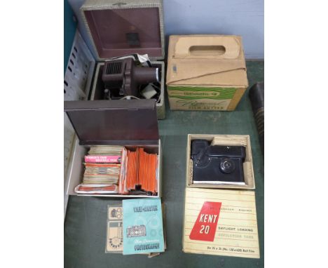 A View-Master Personal Stereo Camera Film Cutter, Projector Viewer, a Kent 20 developing tank and a large collection of slide