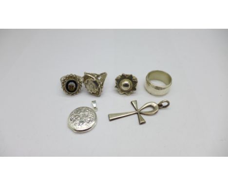 A Victorian hallmarked silver ring, a silver and micro mosaic ring, two other rings, a locket and a pendant 