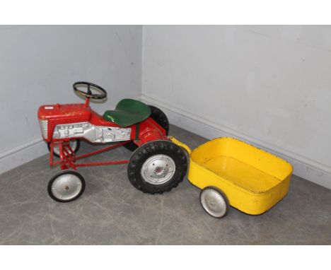 A vintage 1960's Tri-ang/Triang child's pedal tractor, with yellow painted trailer. Original unrestored play worn condition w