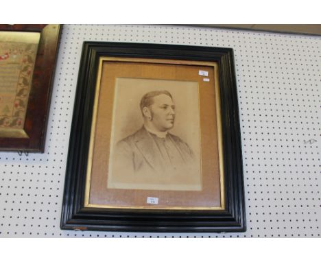 Victorian sepia print, Portrait of a clergy man, the sitter thought to be Reverend H.C. Shuttleworth, 43cm x 33cm, in ebonise