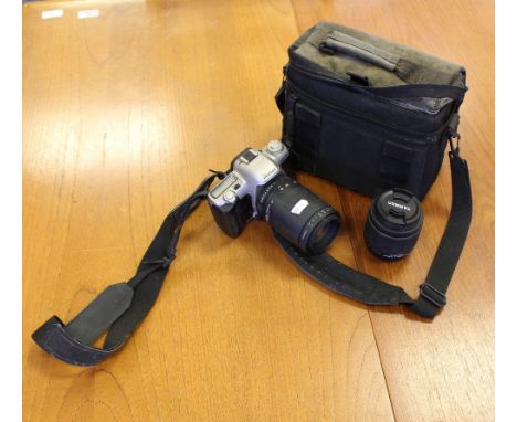 A Pentax MZ-50 digital SLR camera, Tamron 80-210 lens, Tamron 28-80 lens, and camera bag. used condition.