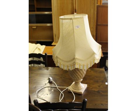 A marble effect pottery urn shaped electric table lamp with silk shade, 75cm high including shade, requires rewiring by a qua