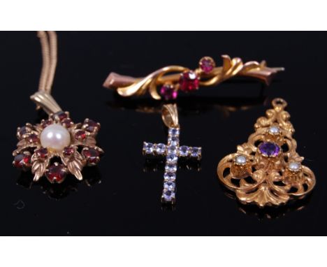 A 9ct gold and amethyst set leaf brooch; a 9ct gold, amethyst and seed pearl set openwork pendant; a 9ct gold, garnet and pea