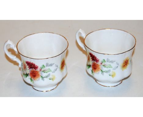 A Paragon bone china 21-place  tea service in the Autumn Glory pattern, in original box