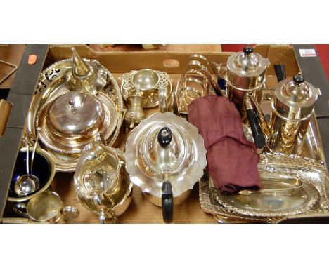 A box of miscellaneous silver plated wares to include early 20th century three piece tea service, four division toast rack, c